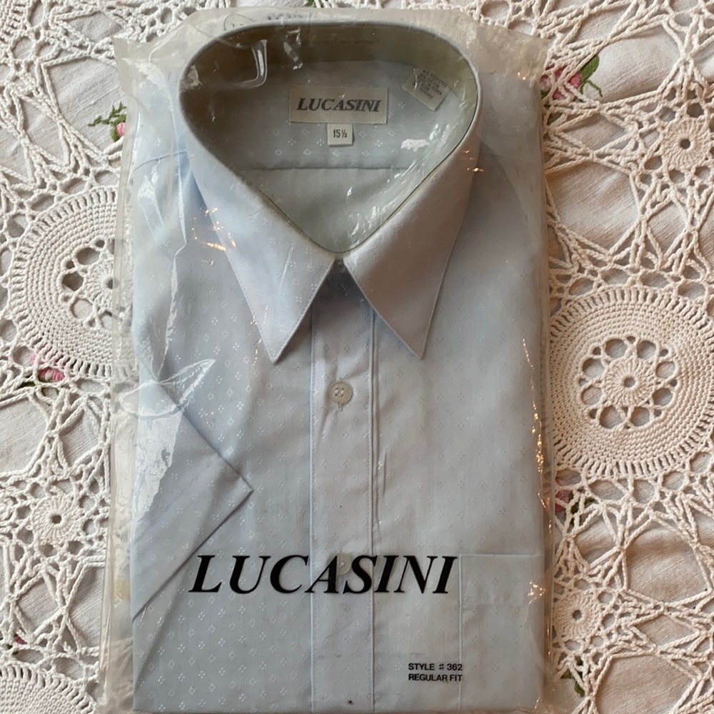 Men’s vintage dress shirt by Lucasini still in packaging.  Short sleeve.